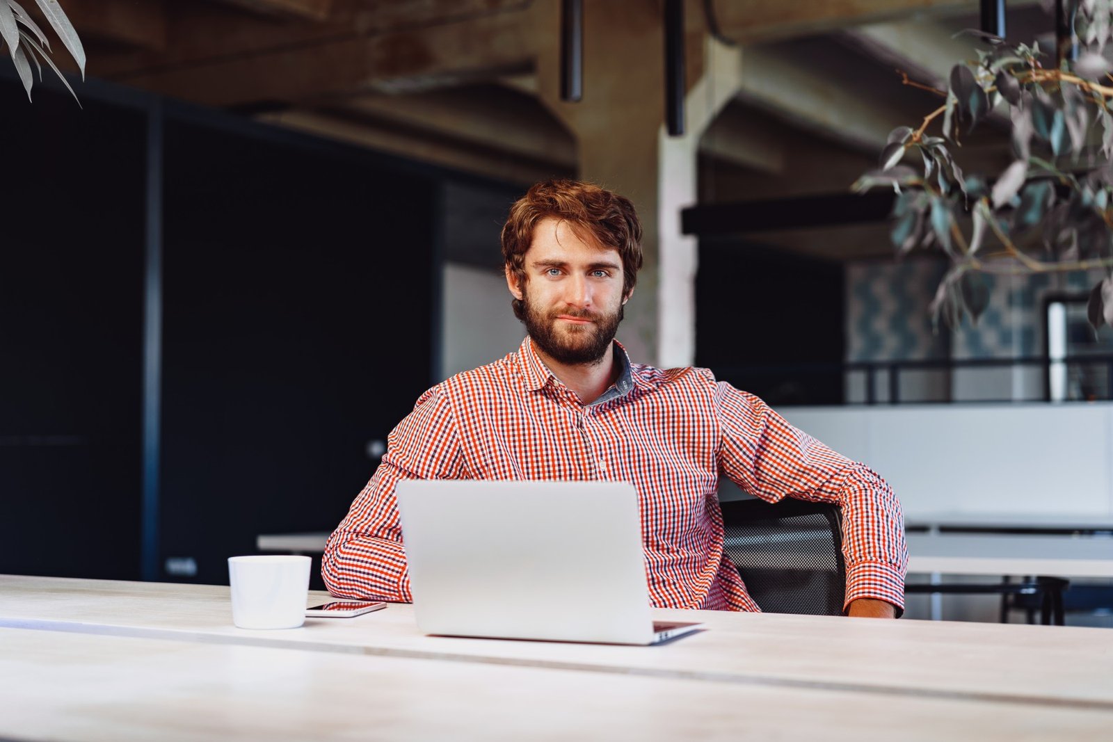 portrait of young caucasian businessman using lapt 2023 11 27 05 12 16 utc 1 1.jpg